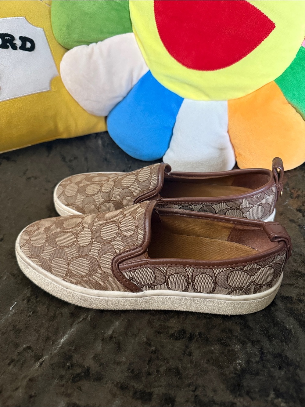 Coach brown Logo slip on sneaker worn but good condition size 8.5